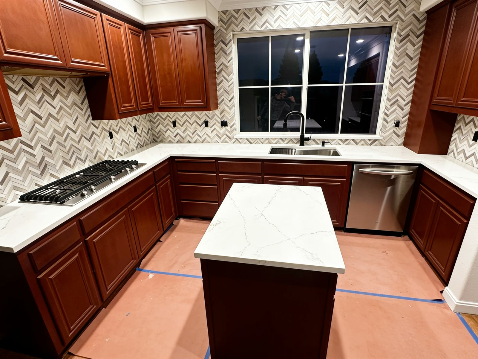 A marble herringbone backsplash